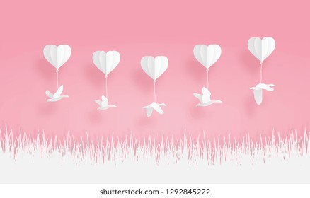 origami balloons with bird teal and grass in valentine paper art concept, pink and white background.