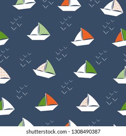 Origami boat and gull. Travelling ship. Seamless origami pattern. Vector illustration. Blue background. For cloth, fabric, wrapping paper, home decor. 