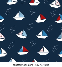Origami boat and gull. Travelling ship. Seamless origami pattern. Vector illustration. Dark blue background. For cloth, fabric, wrapping paper, home decor. 