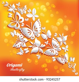 Origami butterflies on the sunny background.