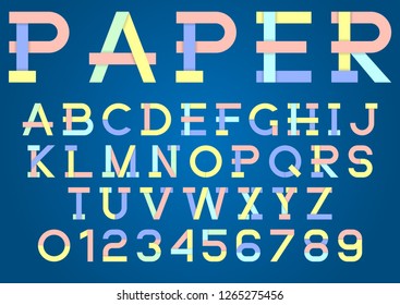 Origami, colored paper alphabet and numbers with shadow.