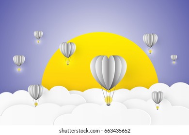 Origami or fold heart shape black and white with light bulb balloon in paper art style float in night time. Include cloud and moon background