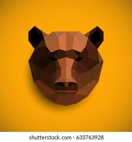 Origami Grizzly bear head. abstract animal paper. geometric logo emblem for designers.  low-polly illustration
