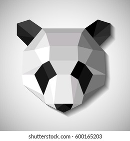 Origami head of an panda. Paper low polly animal. Logo for design