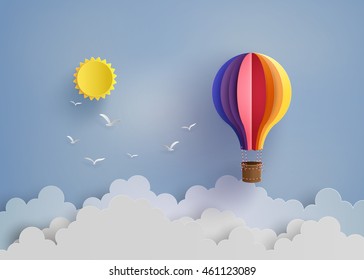 Origami made colorful hot air balloon and  cloud.paper art style.
