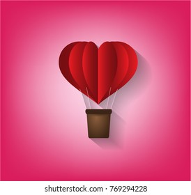 Origami made hot air balloon in a heart shape. paper art style.