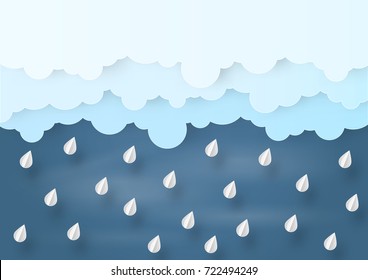 Origami made mobile paper clouds and rain drops on navy sky background. paper art design and craft style.