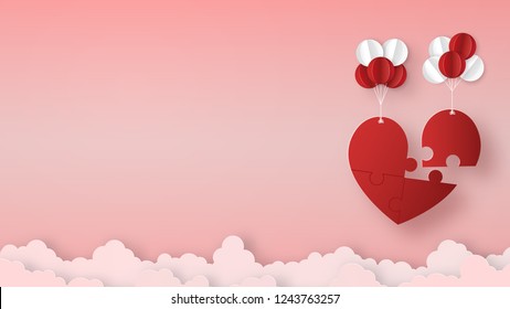 Origami made mobile paper of Heart jigsaw puzzle royalty with red and white balloons float in the sky, paper art design and craft style. Valentine's concept.