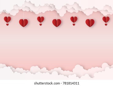 Origami made mobile paper of the red hearts with clouds, copy space, paper art design and craft style. Valentine's concept.