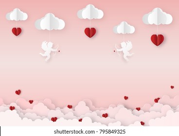 Origami made mobile paper of the red hearts and cupid's with clouds, copy space, paper art design and craft style. Valentine's concept.