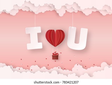Origami made mobile paper of text " I LOVE YOU " with red hot air balloon float in the air, paper art design and craft style. Valentine's concept.