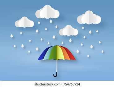 Origami made rainy weather forecast of Water drop on the colorful umbrella, paper art design and craft style.