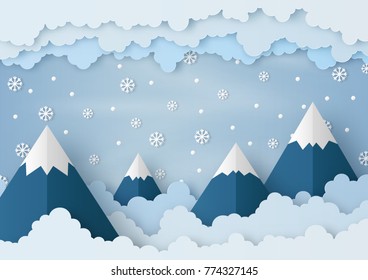 Origami made winter weather forecast of snowballs and snowflakes drop on the mountain,  paper art design and craft style. Christmas concept.