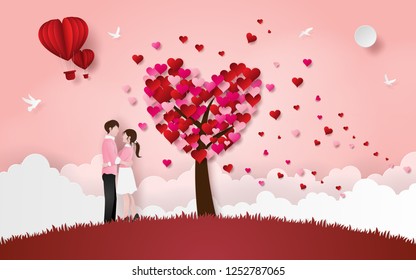 Origami Paper art of Cute couple hug each other on grass floor with heart tree, Love and Happy Valentine's Day