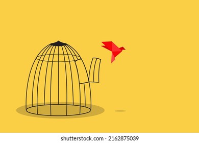 Origami paper bird escape out of birdcage, freedom concept