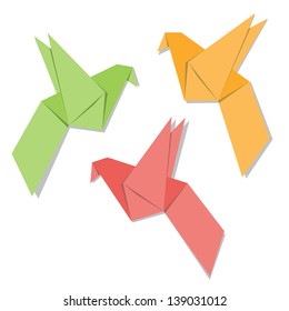 Origami paper bird isolated on white background