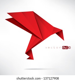 Origami paper bird on abstract background