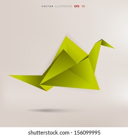 Origami paper bird on abstract background