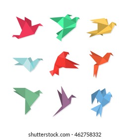 Origami paper birds in a flat style. Vector illustration of pigeons / doves / colibri / hummingbirds set on a white background. Polygonal shape. Paper figures on flight.