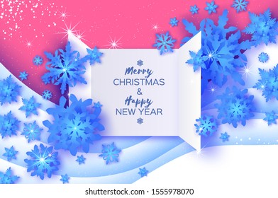 Origami Paper Blue Snowflakes on white pink layered background. Merry Christmas and Happy New Year in paper craft style. Magic Snowfall. Gift box.