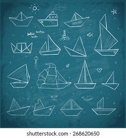 Origami paper boats sketches on blackboard. Paper sailing ships, steamboats, yachts, boats.