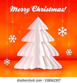 Origami paper vector Christmas tree on orange background