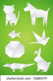 Origami Pets of the white paper on green background