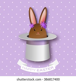 Origami Purple Greeting card with Happy Easter - with Chocolate Easter rabbit and flowers. Bunny ears in magician or illusionist hat. Hiding rabbit. Spring Funny Bunny. Easter Bunny. Easter Egg 