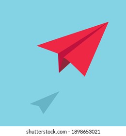 Origami Red paper plane flying in the sky;Startup concept 