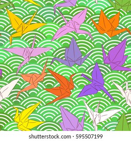 Origami white paper cranes set sketch seamless pattern. line Nature oriental background with japanese wave circle pattern red yellow purple colors on green background. Vector