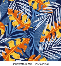 Original abstract seamless pattern with colorful tropical leaves and plants on blue background. Vector design. Jungle print. Flowers background. Printing and textiles. Exotic tropics. Fresh design.