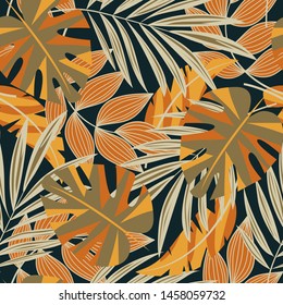 Original abstract seamless pattern with colorful tropical leaves and plants on a dark background. Vector design. Jungle print. Flowers background. Printing and textiles. Exotic tropics. Fresh design.