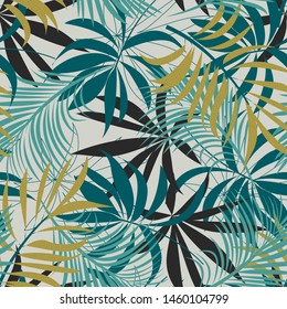 Original abstract seamless pattern with colorful tropical leaves and plants on a delicate background. Vector design. Jungle print. Flowers background. Printing and textiles. Exotic tropics. Fresh desi