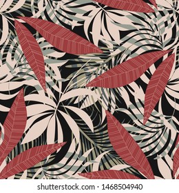 Original abstract seamless pattern with colorful tropical leaves and plants on a dark background. Vector design. Jungle print. Floral background. Printing and textiles. Exotic tropics. Summer.