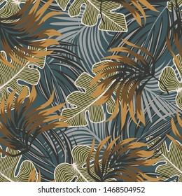 Original abstract seamless pattern with colorful tropical leaves and plants on blue background. Vector design. Jungle print. Floral background. Printing and textiles. Exotic tropics. Summer.