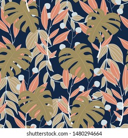 Original abstract seamless pattern with colorful tropical leaves and plants on blue background. Vector design. Jungle print. Floral background. Printing and textiles. Exotic tropics. Summer.