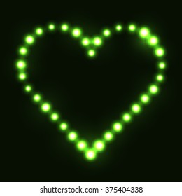 Original heart made from green dots / pearls/ bulbs / circles on dark background