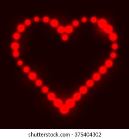 Original heart made from red dots / pearls/ bulbs / circles on dark background