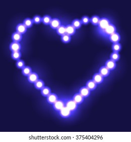 Original heart made from violet dots / pearls/ bulbs / circles on dark background