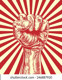 An original illustration of a revolutionary fist held in the air in a vintage wood cut propaganda style