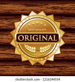 Original quality gold retro medal on a wooden plank background