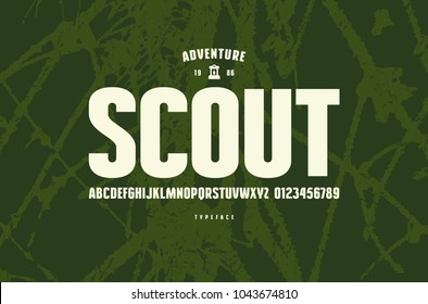 Original Sans Serif Font. Bold Face. Letters And Numbers For Logo And Emblem Design. White Print On Green Texture Background