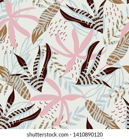 Original seamless pattern with tropical plants and leaves on beige background. Vector design. Jungle print. Textiles and printing.