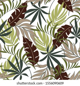 Original seamless tropical pattern with bright yellow and Burgundy plants and leaves on a white background. Tropical botanical. Beautiful exotic plants.  Trendy summer Hawaii print.