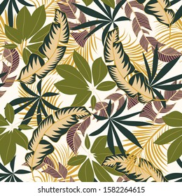 Original seamless tropical pattern with bright pink and green plants and leaves on a white background. Modern abstract design for fabric, paper, interior decor. Exotic jungle wallpaper.