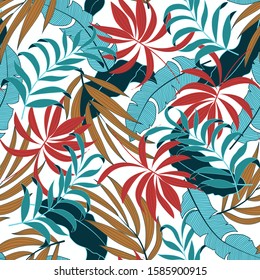 Original seamless tropical pattern with bright blue and red plants and leaves on a white background. Exotic jungle wallpaper. Hawaiian style. Colorful stylish floral.