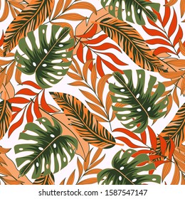 Original seamless tropical pattern with bright green and yellow plants and leaves on a delicate background. Modern abstract design for fabric, paper, interior decor. Beautiful exotic plants. 