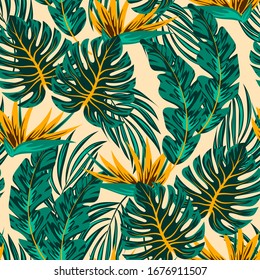 Original seamless tropical pattern with bright leaves and plants on a beige background. Exotic jungle wallpaper. Summer colorful hawaiian seamless pattern with tropical plants.