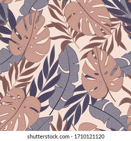 Original seamless tropical pattern with bright plants and leaves on a beige background. Exotic wallpaper. Seamless exotic pattern with tropical plants. Hawaiian style.