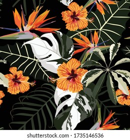 Original seamless tropical pattern with bright leaves and orange hibiscus strelitzia flowers background. Modern abstract design for fabric, paper, interior décor. Hawaiian style.